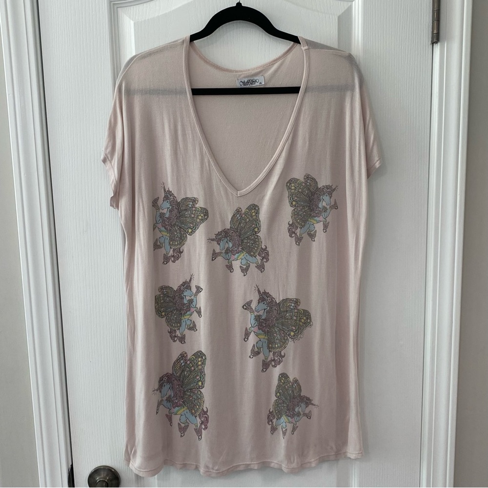 Lauren Moshi pink v-neck tee with roller skating winged unicorn all over graphic